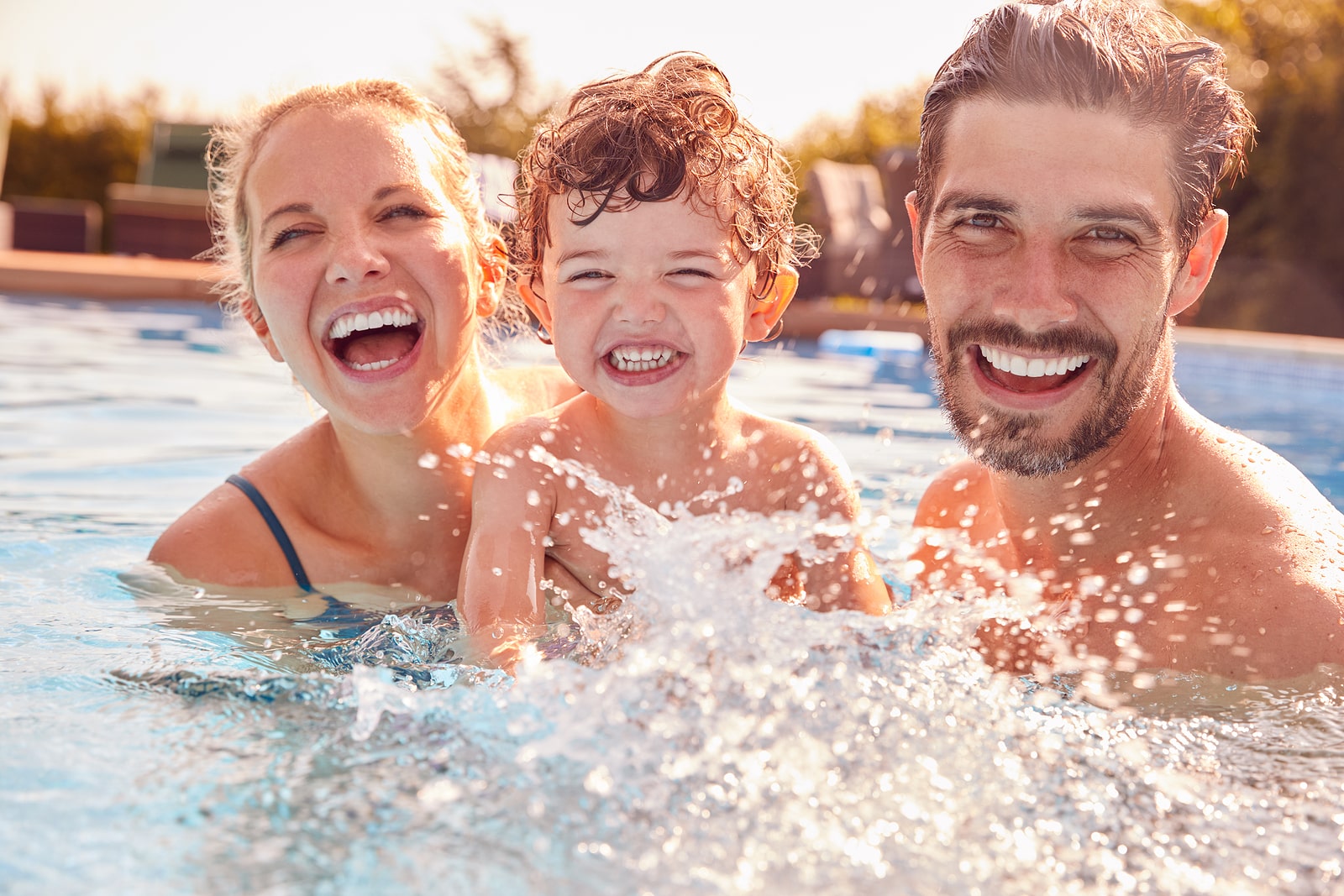 family at pool, apex pavers and pools